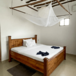 Ložnice ubytování na Zanzibaru