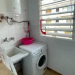 Součástí apartmánu na Mallorce je i pračka